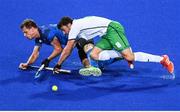 12 August 2016; Chris Cargo of Ireland in action against Lucas Rossi of Argentina during the Pool B match between Ireland and Argentina at the Olympic Hockey Centre, Deodoro, during the 2016 Rio Summer Olympic Games in Rio de Janeiro, Brazil. Photo by Stephen McCarthy/Sportsfile