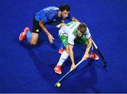 12 August 2016; Alan Sothern of Ireland in action against Manuel Brunet of Argentina during the Pool B match between Ireland and Argentina at the Olympic Hockey Centre, Deodoro, during the 2016 Rio Summer Olympic Games in Rio de Janeiro, Brazil. Photo by Stephen McCarthy/Sportsfile