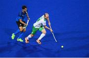 12 August 2016; Peter Caruth of Ireland in action against Matias Rey of Argentina during the Pool B match between Ireland and Argentina at the Olympic Hockey Centre, Deodoro, during the 2016 Rio Summer Olympic Games in Rio de Janeiro, Brazil. Photo by Stephen McCarthy/Sportsfile