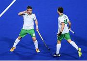 12 August 2016; Shane O'Donoghue of Ireland, left, celebrates scoring his side's second goal with team mate Kyle Good during the Pool B match between Ireland and Argentina at the Olympic Hockey Centre, Deodoro, during the 2016 Rio Summer Olympic Games in Rio de Janeiro, Brazil. Photo by Stephen McCarthy/Sportsfile