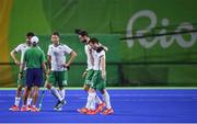 12 August 2016; Paul Gleghorne of Ireland consoles team mate John Jackson following defeat after the Pool B match between Ireland and Argentina at the Olympic Hockey Centre, Deodoro, during the 2016 Rio Summer Olympic Games in Rio de Janeiro, Brazil. Photo by Stephen McCarthy/Sportsfile