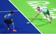 12 August 2016; Peter Caruth of Ireland in action against Pedro Ibarra of Argentina during the Pool B match between Ireland and Argentina at the Olympic Hockey Centre, Deodoro, during the 2016 Rio Summer Olympic Games in Rio de Janeiro, Brazil. Photo by Stephen McCarthy/Sportsfile