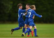 13 August 2016;  Glen Bracken of Newbridge Town celebrates after scoring a goal against Aisling Annacotty with team-mates James Mahony, left, and Ethan Mountaine, right, during Day 1 of the Volkswagen Junior Masters Under 13 Football Tournament at the AUL Complex in Clonshaugh, Dublin. Photo by Sportsfile