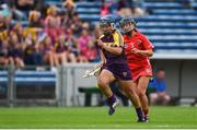 13 August 2016; Katrina Parrock of Wexford in action against Laura Treacy of Cork during the Liberty Insurance Senior Camogie Championship Semi-Final game between Cork and Wexford at Semple Stadium in Thurles, Co Tipperary. Photo by Daire Brennan/Sportsfile
