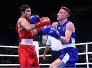 13 August 2016; Brendan Irvine of Ireland, right, in action against Shakhobidin Zoirov of Uzbekistan during their Light-Flyweight preliminary round of 32 bout in the Riocentro Pavillion 6 Arena during the 2016 Rio Summer Olympic Games in Rio de Janeiro, Brazil. Photo by Stephen McCarthy/Sportsfile