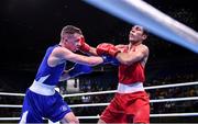13 August 2016; Brendan Irvine of Ireland, left, in action against Shakhobidin Zoirov of Uzbekistan during their Light-Flyweight preliminary round of 32 bout in the Riocentro Pavillion 6 Arena during the 2016 Rio Summer Olympic Games in Rio de Janeiro, Brazil. Photo by Stephen McCarthy/Sportsfile