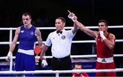 13 August 2016; Mohammed Rabii of Morocco is declared victorious over Steven Donnelly of Ireland during their Welterweight preliminary round of 32 bout in the Riocentro Pavillion 6 Arena during the 2016 Rio Summer Olympic Games in Rio de Janeiro, Brazil. Photo by Stephen McCarthy/Sportsfile