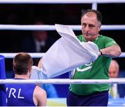 13 August 2016; Team Ireland coach Zaur Antia with Steven Donnelly of Ireland during his Welterweight preliminary round of 32 bout defeat to Mohammed Rabii of Morocco in the Riocentro Pavillion 6 Arena during the 2016 Rio Summer Olympic Games in Rio de Janeiro, Brazil. Photo by Stephen McCarthy/Sportsfile