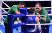 13 August 2016; Team Ireland coach Zaur Antia with Steven Donnelly of Ireland during his Welterweight preliminary round of 32 bout defeat to Mohammed Rabii of Morocco in the Riocentro Pavillion 6 Arena during the 2016 Rio Summer Olympic Games in Rio de Janeiro, Brazil. Photo by Stephen McCarthy/Sportsfile