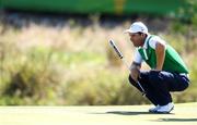 13 August 2016; Padraig Harrington of Ireland lines up a putt on the 16th green during Round 3 of the Men's Strokeplay competition at the Olympic Golf Course, Barra de Tijuca, during the 2016 Rio Summer Olympic Games in Rio de Janeiro, Brazil. Photo by Ramsey Cardy/Sportsfile