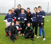 29 October 2010; Ulster bank GAA star Kevin McGuckin, Derry, pictured with players, from the Ardglass GAA Under 10s and Under 12s, who won a coaching session courtesy of Ulster Bank. Ulster Bank GAA Coaching Session, Ardglass GAC, Ardglass, Co. Down. Picture credit: Oliver McVeigh / SPORTSFILE