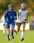 30 October 2010; Roisin O'Keeffe, Ireland, in action against Kirsty Deans, Scotland. Ladies Shinty / Camogie International, Ireland v Scotland, Ratoath GAA Club, Ratoath, Co. Meath. Picture credit: Alan Place / SPORTSFILE
