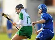 30 October 2010; Colette McSorley, Ireland, in action against Elaine Wink, Scotland. Ladies Shinty / Camogie International, Ireland v Scotland, Ratoath GAA Club, Ratoath, Co. Meath. Picture credit: Alan Place / SPORTSFILE