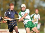 30 October 2010; Christopher Murray, Ireland, in action against Owen Fraser, Scotland. U21 Shinty - Hurling International Final, Ireland v Scotland, Ratoath GAA Club, Ratoath, Co. Meath. Picture credit: Barry Cregg / SPORTSFILE