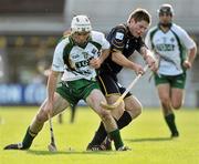 30 October 2010; Chistopher Murray, Ireland, in action against Drew Howie, Scotland. U21 Shinty - Hurling International Final, Ireland v Scotland, Ratoath GAA Club, Ratoath, Co. Meath. Picture credit: Barry Cregg / SPORTSFILE