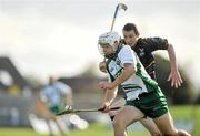 30 October 2010; Darragh O'Connell, Ireland, in action against Rory Kennedy, Scotland. U21 Shinty - Hurling International Final, Ireland v Scotland, Ratoath GAA Club, Ratoath, Co. Meath. Picture credit: Barry Cregg / SPORTSFILE