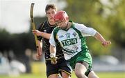 30 October 2010; Neil Heffernan, Ireland, in action against Daniel Grieve, Scotland. U21 Shinty - Hurling International Final, Ireland v Scotland, Ratoath GAA Club, Ratoath, Co. Meath. Picture credit: Barry Cregg / SPORTSFILE