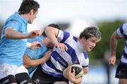 30 October 2010; Alan MacGinty, Blackrock, is tackled by Declan Cusack and Ronan O'Mahony, Garryowen. All-Ireland League Division 1A, Blackrock v Garryowen, Stradbrook Road, Blackrock, Dublin. Picture credit: Matt Browne / SPORTSFILE