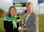 30 October 2010; Ireland captain Niamh Breen is presented with the Camogie/Shinty International cup by the Camogie Association President Joan O'Flynn. Ladies Shinty / Camogie International, Ireland v Scotland, Ratoath GAA Club, Ratoath, Co. Meath. Picture credit: Alan Place / SPORTSFILE