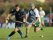 30 October 2010; Adrian Royle, Ireland, in action against Tom Whyte, Scotland. U21 Shinty - Hurling International Final, Ireland v Scotland, Ratoath GAA Club, Ratoath, Co. Meath. Picture credit: Alan Place / SPORTSFILE