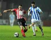 30 October 2010; Eddie McCallion, Derry City, in action against Cathal O'Connor, Monaghan United. Airtricity League First Division, Monaghan United v Derry City, Gortakeegan, Monaghan. Picture credit: Oliver McVeigh / SPORTSFILE