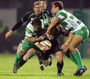 30 October 2010; Keith Matthews, Connacht, is tackled by Tommaso Benvenuti and Tobie Botes, Benetton Treviso. Celtic League, Benetton Treviso v Connacht, Stadio Di Mongio, Treviso, Italy. Picture credit: Daniele Resini / SPORTSFILE