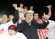 30 October 2010; John Hume celebrates with Derry City players and fans. Airtricity League First Division, Monaghan United v Derry City, Gortakeegan, Monaghan. Picture credit: Oliver McVeigh / SPORTSFILE