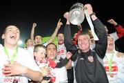 30 October 2010; Derry City manager Stephen Kenny and his players celebrate with the Airtricity League First Division trophy. Airtricity League First Division, Monaghan United v Derry City, Gortakeegan, Monaghan. Picture credit: Oliver McVeigh / SPORTSFILE