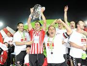 30 October 2010; Mark Farren, Derry City, centre, celebrates with the Airtricity League First Division trophy. Airtricity League First Division, Monaghan United v Derry City, Gortakeegan, Monaghan. Picture credit: Oliver McVeigh / SPORTSFILE