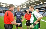 30 October 2010; Referee Tony Carroll tosses the coin between Scotland captain Gary Innes and Ireland captain Tommy Walsh before the game. Senior Hurling / Shinty International 1st Test, Ireland v Scotland, Croke Park, Dublin. Picture credit: Diarmuid Greene / SPORTSFILE