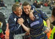 30 October 2010; Iain McDonald, Scotland, is congratulated by a supporter after the game. Senior Hurling / Shinty International 1st Test, Ireland v Scotland, Croke Park, Dublin. Picture credit: Diarmuid Greene / SPORTSFILE