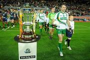 30 October 2010; Ireland captain Steven McDonnell passes the Cormac McAnallen Cup ahead of the game. Irish Daily Mail International Rules Series 2nd Test, Ireland v Australia, Croke Park, Dublin. Picture credit: Stephen McCarthy / SPORTSFILE