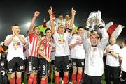 30 October 2010; The Derry City players celebrates with the Airtricity League First Division trophy. Airtricity League First Division, Monaghan United v Derry City, Gortakeegan, Monaghan. Picture credit: Oliver McVeigh / SPORTSFILE