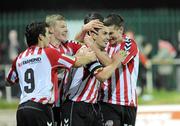 30 October 2010; Mark Farren, Derry City, is congratulated by David McDaid, James McClean and Patrick McEleney, after scoring the winning goal. Airtricity League First Division, Monaghan United v Derry City, Gortakeegan, Monaghan. Picture credit: Oliver McVeigh / SPORTSFILE