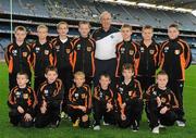 30 October 2010; The Carrickfergus squad, with Paudie Butler, GAA National Hurling Director. Camánabú Exhibition Games, Croke Park, Dublin. Picture credit: Stephen McCarthy / SPORTSFILE