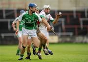 31 October 2010; Brian Hogan, O'Loughlin Gaels, in action against Alan Delaney, Rathdowney/Errill. AIB GAA Hurling Leinster Club Senior Championship Quarter-Final, Rathdowney/Errill v O'Loughlin Gaels, O'Moore Park, Portlaoise, Co. Laois. Picture credit: Barry Cregg / SPORTSFILE