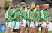 31 October 2010; Kilmallock players stand together during the playing of the National Anthem. AIB GAA Hurling Munster Club Senior Championship Quarter-Final, Crusheen v Kilmallock, Cusack Park, Ennis, Co. Clare. Picture credit: Diarmuid Greene / SPORTSFILE