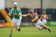 31 October 2010; Paul Finn, Ballyfin, in action against Shane Bergin, John Lockes Callan. AIB GAA Hurling Leinster Club Junior Championship Quarter-Final, John Lockes Callan v Ballyfin, O'Moore Park, Portlaoise, Co. Laois. Picture credit: Barry Cregg / SPORTSFILE