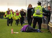 31 October 2010; Medics make their way to a St Gall's official after he was knocked to the ground during the game. AIB GAA Football Ulster Club Senior Championship Quarter-Final, Crossmaglen Rangers v St Gall's, Crossmaglen, Co. Armagh. Photo by Sportsfile