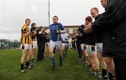 31 October 2010; St Gall's captain Colin Brady makes his way on to the pitch past a Crossmaglen Rangers guard of honor. AIB GAA Football Ulster Club Senior Championship Quarter-Final, Crossmaglen Rangers v St Gall's, Crossmaglen, Co. Armagh. Photo by Sportsfile