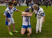 13 August 2016; Kevin Moran of Waterford is comforted by two supporters after the GAA Hurling All-Ireland Senior Championship Semi-Final Replay game between Kilkenny and Waterford at Semple Stadium in Thurles, Co Tipperary. Photo by Ray McManus/Sportsfile