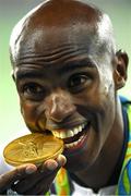 13 August 2016; Mo Farah of Great Britain with his gold medal for the Men's 10000m in the Olympic Stadium, Maracanã, during the 2016 Rio Summer Olympic Games in Rio de Janeiro, Brazil. Photo by Brendan Moran/Sportsfile