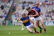 14 August 2016; Jerome Cahill of Tipperary, supported by team-mate Cian Flanagan, behind, in action against Jack Canning of Galway during the Electric Ireland GAA Hurling All-Ireland Minor Championship Semi-Final game between Galway and Tipperary at Croke Park, Dublin. Photo by Piaras Ó Mídheach/Sportsfile