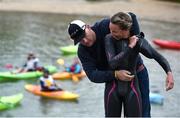 14 August 2016; Susie Cheetham of England is helped putting on her wetsuit by her husband Rob before the Dublin Ironman 70.3 competition at Dun Laoghoire pier, Dublin. Photo by David Fitzgerald/Sportsfile