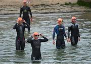 14 August 2016; Competitors enter the water before the Dublin Ironman 70.3 competition at Dun Laoghoire pier, Dublin. Photo by David Fitzgerald/Sportsfile