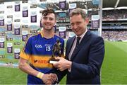 14 August 2016; Cian Darcy of Tipperary is presented with the Electric Ireland Man of the Match by Jim Dollard, Executive Director for Business Service Centre and Electric Ireland after the All-Ireland Minor Championship Semi-Finalthe Electric Ireland GAA Hurling All-Ireland Minor Championship Semi-Final game between Galway and Tipperary at Croke Park, Dublin. Photo by Ray McManus/Sportsfile