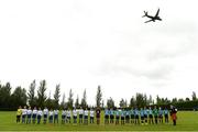 14 August 2016; The Belvedere and Crumlin United teams stand for the National Anthem before the start of the final of the Volkswagen Junior Masters Under 13 Football Tournament at the AUL Sports Grounds, Dublin Airport, Dublin. Photo by Sportsfile