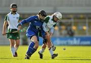 30 October 2010; Shauna Jordan, Ireland, with support from Bernie Murray, in action against Katy Smith, Scotland. Ladies Shinty / Camogie International, Ireland v Scotland, Ratoath GAA Club, Ratoath, Co. Meath. Picture credit:  Barry Cregg / SPORTSFILE