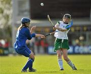 30 October 2010; Susie O'Carroll, Ireland, in action against Katie Myrescough, Scotland. Ladies Shinty / Camogie International, Ireland v Scotland, Ratoath GAA Club, Ratoath, Co. Meath. Picture credit:  Barry Cregg / SPORTSFILE
