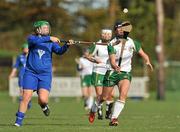 30 October 2010;Bernie Murray, Ireland, in action against Orla Coughlin, Scotland. Ladies Shinty / Camogie International, Ireland v Scotland, Ratoath GAA Club, Ratoath, Co. Meath. Picture credit:  Barry Cregg / SPORTSFILE